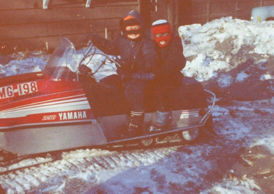 David and Scott snowmobiling
