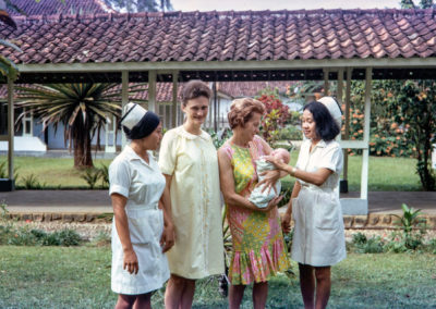 Sue and her mother with David and hospital nurses